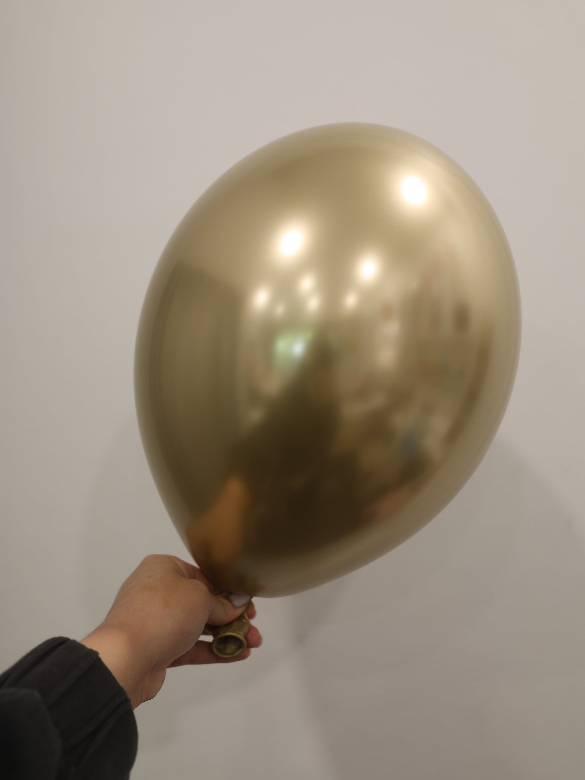 Złoty balon z helem
